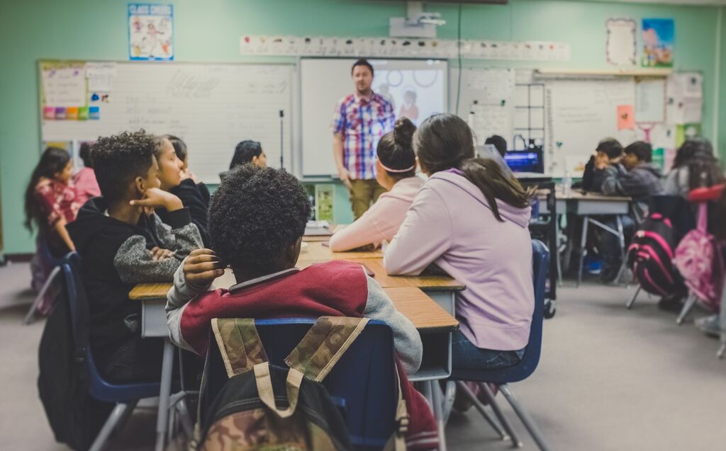 Picture of a teacher and his class