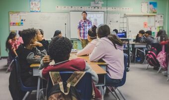 Picture of a teacher and his class