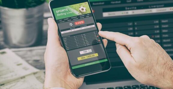 Football gambling online smartphone laptop 0