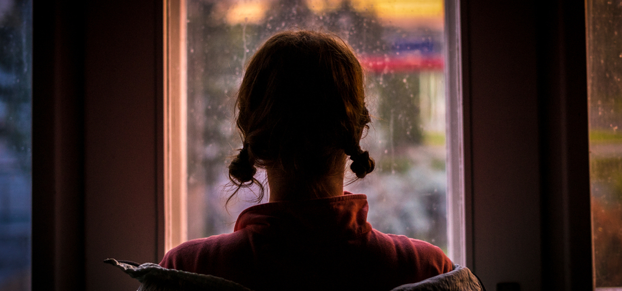 Woman looking out window silhouette exploitation small