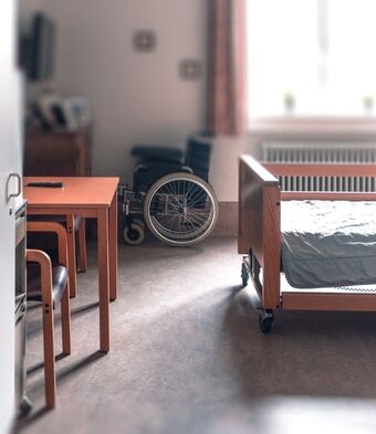 Assisted suicide dying hospital bed care home