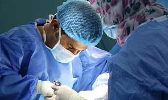 Surgeon performing operation