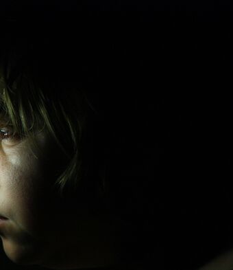 Child alone dark