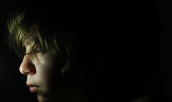 Child alone dark