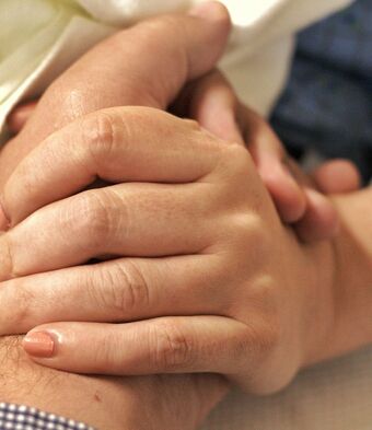 Hands hospital dying