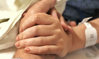 Hands hospital dying